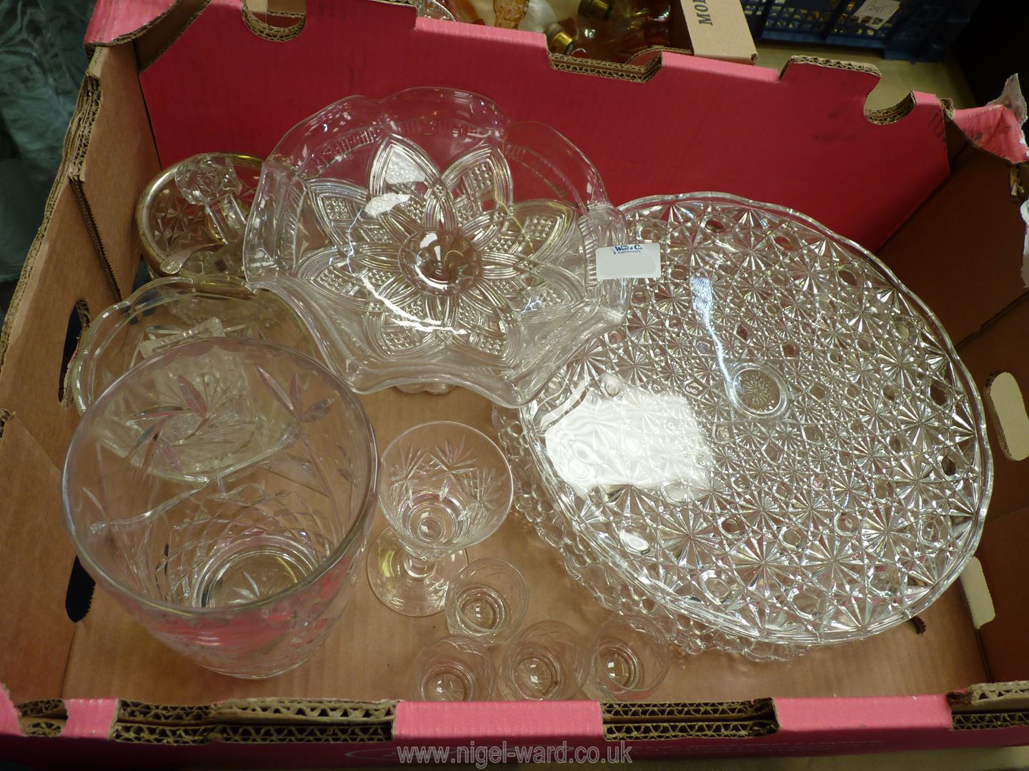 A quantity of glass to include cake plates, sugar bowl, knife rests, vase, liquor glasses, etc.