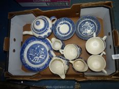 A quantity of willow pattern china by Woods Ware, Churchill, Broadstairs etc,