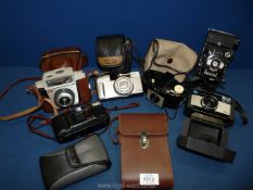 A quantity of cameras including Kershaw eight-20 Penguin bellows, Canon Z115, Yashica Af-J2 35 mm,