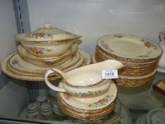 A quantity of Ridgways dinnerware including two lidded tureens, three graduated meat plates,