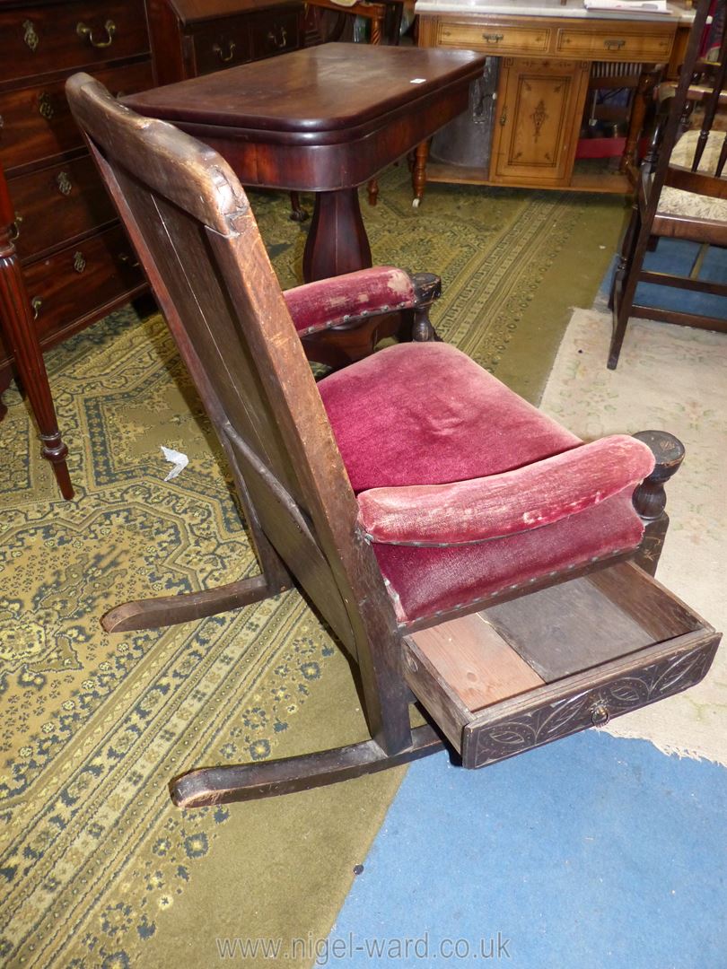 An unusual dark oak Rocking Chair having carved decoration and unusually with an underseat drawer - Image 2 of 3