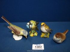 Four small china birds including Beswick Goldcrest (a/f) and a blue tit,