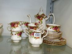 A Royal Albert ''Old Country Roses'' part coffee service to include six cups and saucers,