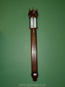 A Mahogany Stick Barometer by Russell of Norwich.