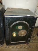 A heavy lockable Safe by Linham Brothers 'Furnishing Ironmongers' - ''Patent Hold Fast Safe'' -