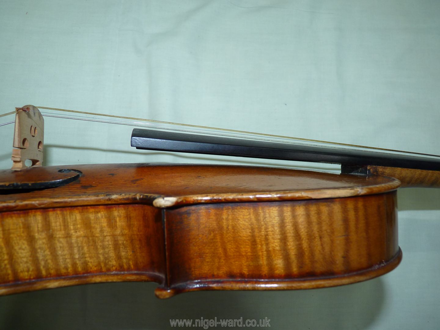 An antique violin having a well-carved scroll and nicely figured body including the back, - Image 22 of 49