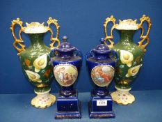 A pair of blue china urns with classical scenes (12" tall),