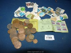 A small quantity of English stamps and a small quantity of old pennies, half pennies,
