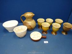 A quantity of Studio Pottery to include goblets, large jug, jelly moulds and various other items.