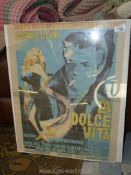 A framed poster of La Dolce Vita.