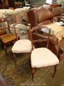 A pair of circa 1900 Walnut framed side Chairs having turned and fluted front legs and overstuffed