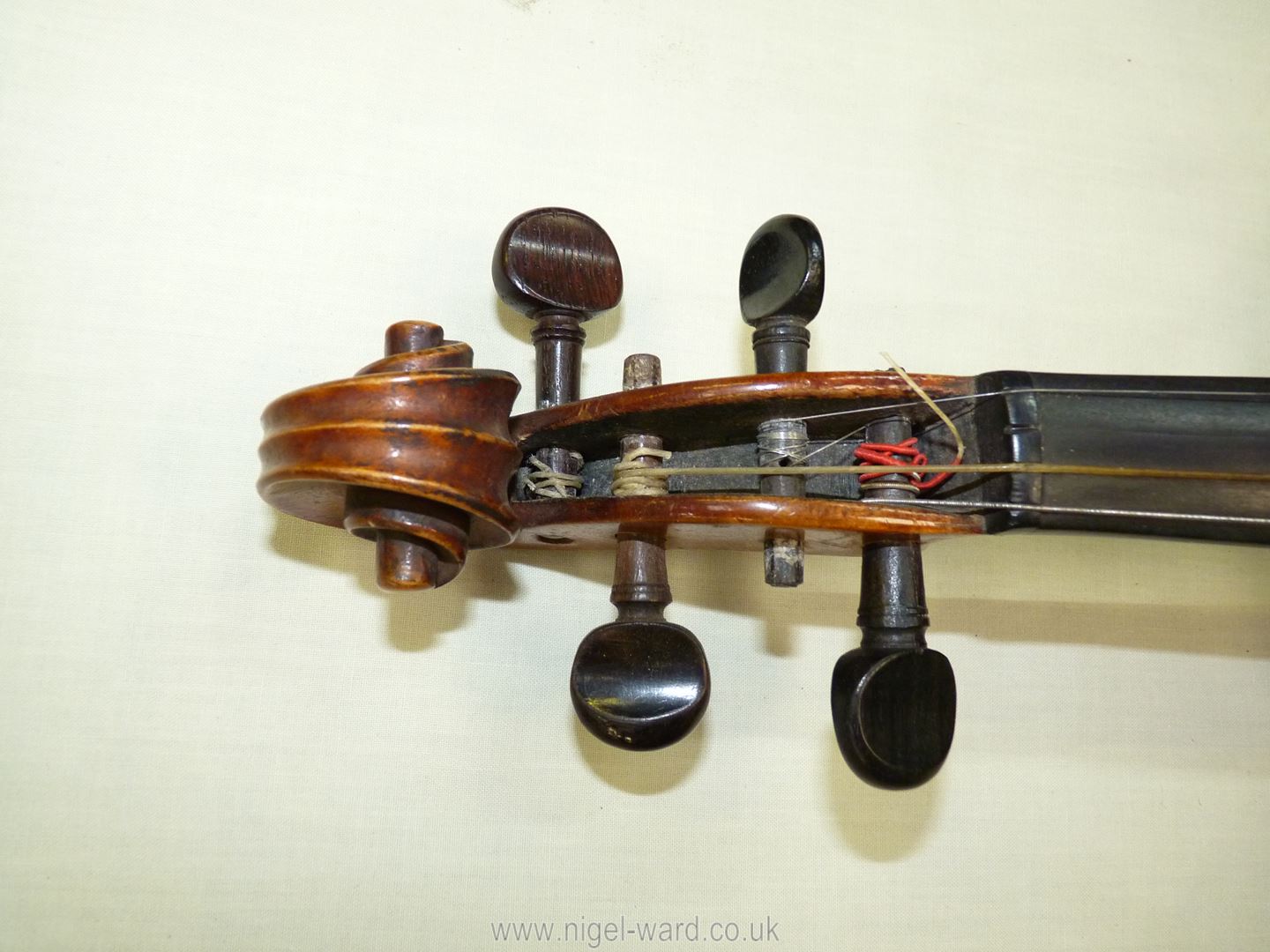 An antique violin having a well-carved scroll and nicely figured body including the back, - Image 9 of 49