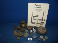 A variety of collector's weights, accompanied with scales and measures booklet.