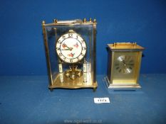 A quartz carriage clock in brass,