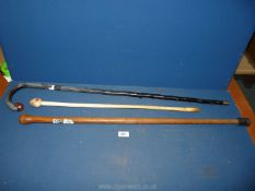 Three walking sticks (two with knop handles).