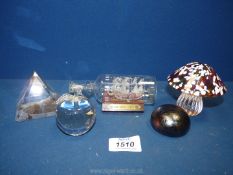A small quantity of paperweights to include Royal Doulton apple, Essex mushroom, Isle of Wight,