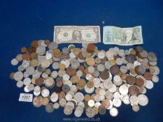 A quantity of old foreign currency coins and notes including America, France, Turkey, Greece,