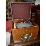 An EKCO table top Radiogram having a Garrard record deck.