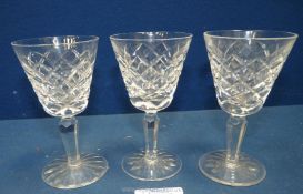 Three Waterford crystal sherry glasses.
