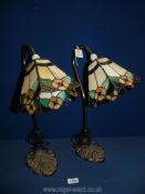 A pair of art nouveau Tiffany style lamps, one shade a/f.