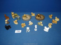 A quantity of Wade Whimsy dogs to include two puppies in baskets, Labrador, German shepherd, Corgi,