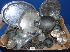 A quantity of mixed metals including EPNS serving dishes, napkin rings, novelty ashtray, pewter urn,