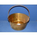 A large brass Preserving pan with metal handle, 15'' diameter x 16'' high.
