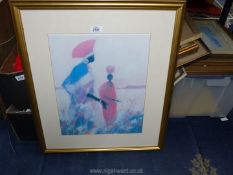 A framed and mounted Print depicting two African ladies.