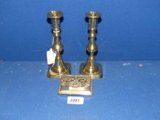 A pair of 19th Century brass ejector candlesticks, plus a brass Art Nouveau stamp box.