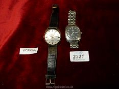 Two wristwatches including Rotary day date stainless steel Automatic and Excalibur Incabloc,
