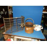 A brass and wire mesh fire guard ( 22'' wide x 11'' deep x 16 1/2'' tall) and brass companion set