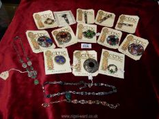 A quantity of Celtic jewellery, mostly brooches by Miracle and two necklaces and a bracelet.