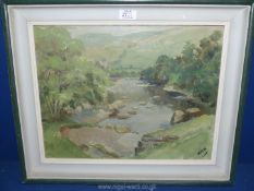 A framed and mounted oil on board depicting a river landscape with tree lined banks and rolling