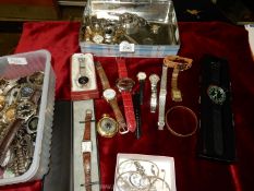 A quantity of gents watches and a small quantity of mixed jewellery.