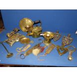 A quantity of brass including pestle and mortar, trivet, Salters spring balance scales etc.