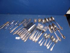 A quantity of plated Queens pattern cutlery; six of each, plus silver plated nut crackers.