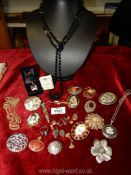 A quantity of miscellaneous brooches including two 9 ct gold necklaces and earrings and Celtic