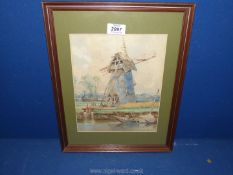 A framed and mounted watercolour depicting a windmill by a canal with barges,