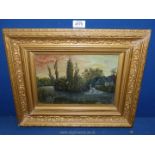 An ornate framed oil on board depicting a water mill, signed lower right 'J.