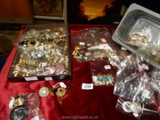 A quantity of vintage costume jewellery to include; necklaces, earrings, etc.