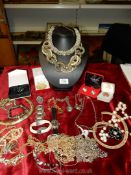 A small quantity of jewellery including chains, necklaces, a pair of earrings, two costume rings,