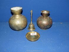 Two attractive oriental brass vases with intricate engraving,