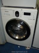 A Samsung washing machine, 33'' high x 23 1/4'' wide x 23'' deep.