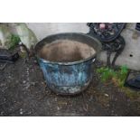 A riveted Copper boiling Pot, converted to planter and stand or useful as a log box,