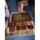 A quantity of 'Art Silk' rugs, approximately 26" x 45".