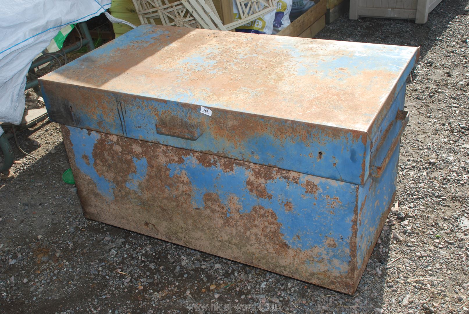 A large metal van vault/trunk 37" wide x 27" deep x 28" high.