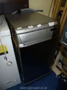 A Hotpoint 'Ultima' compact Dishwasher, 23'' deep x 34'' high x 17 1/2'' wide.