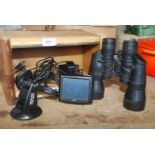 A pair of binoculars, Roadcom sat nav, voltage leads, etc.