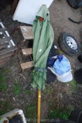 Decorating steps and a large garden parasol.