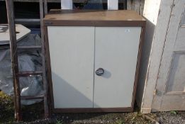 A metal Cabinet, 35 1/2'' x 18'' x 41'' high, no key present.